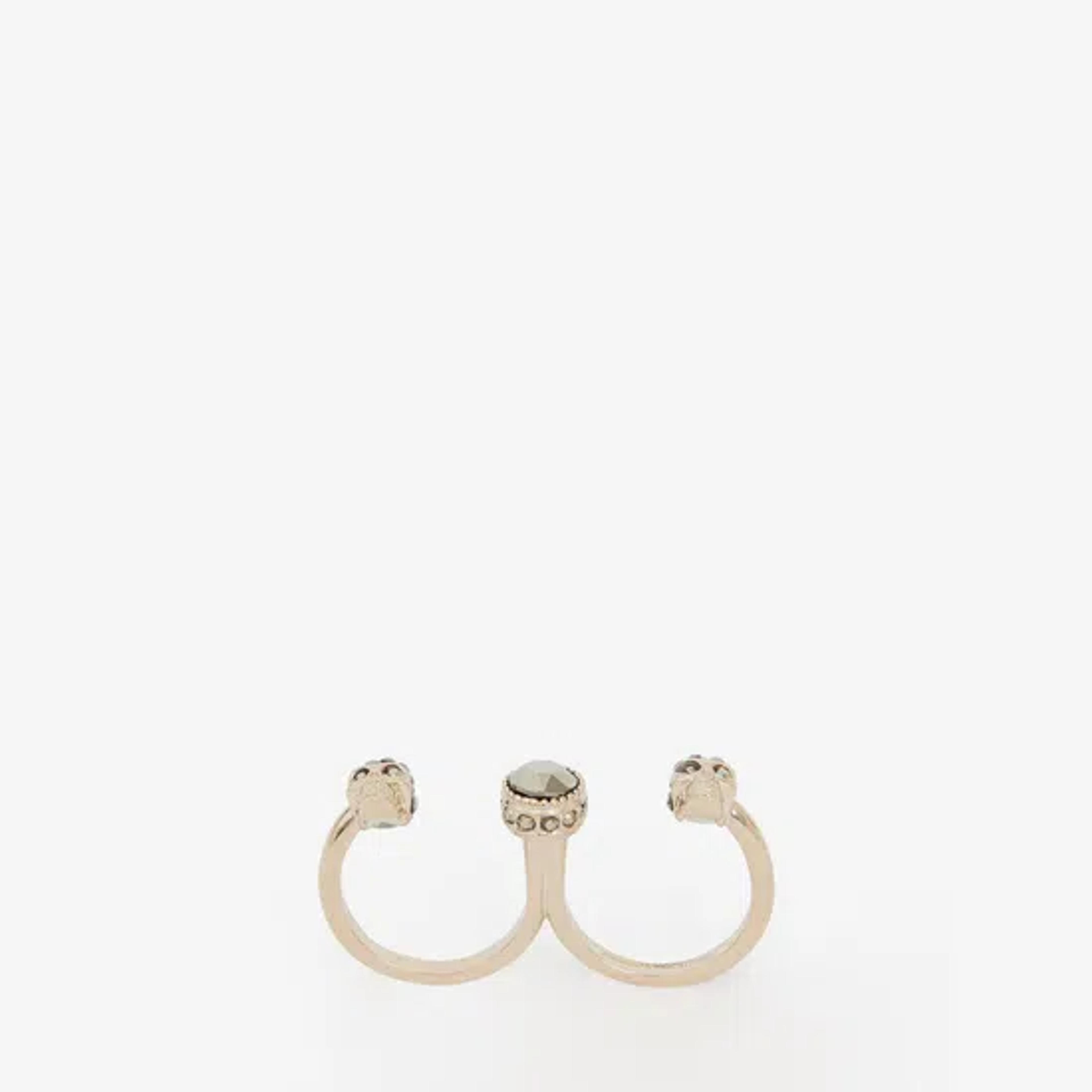 Alexander McQueen Double Skull Ring in Pale Gold | THE YES