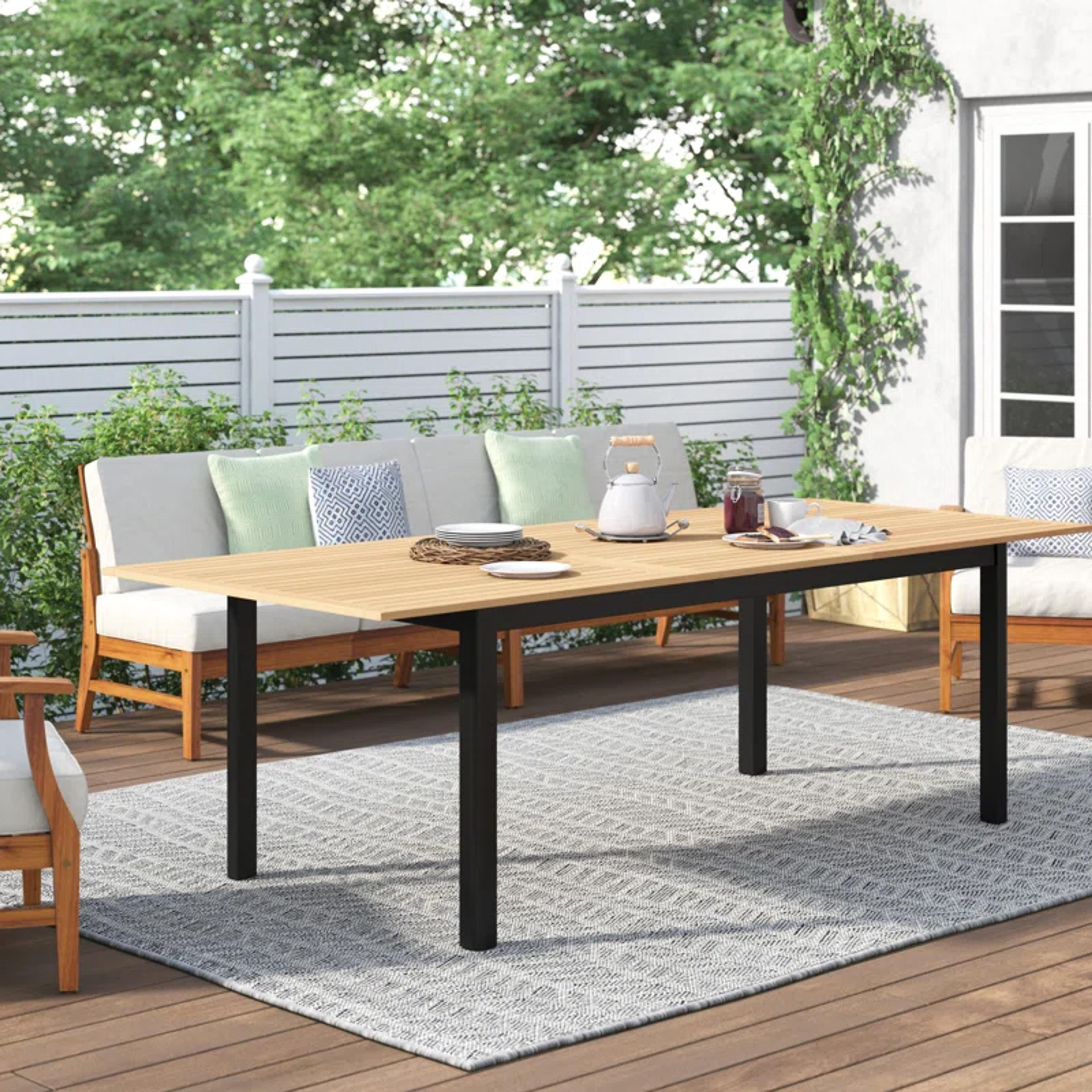 Kitsco Rafael Teak Finish Rectangle Extendable Patio Table | Wayfair