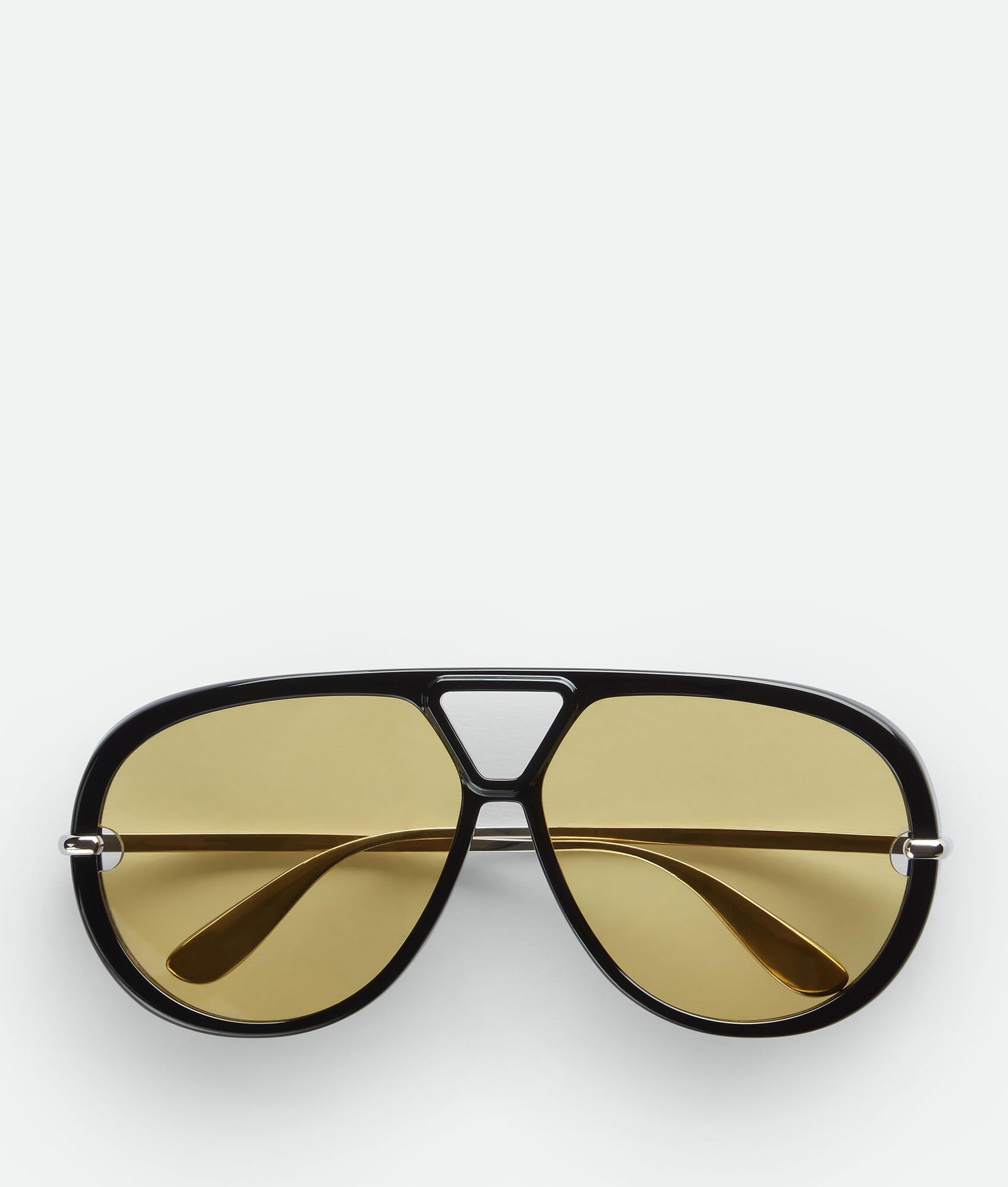 Bottega Veneta® Classic Aviator Sunglasses in Black/yellow. Shop online now.