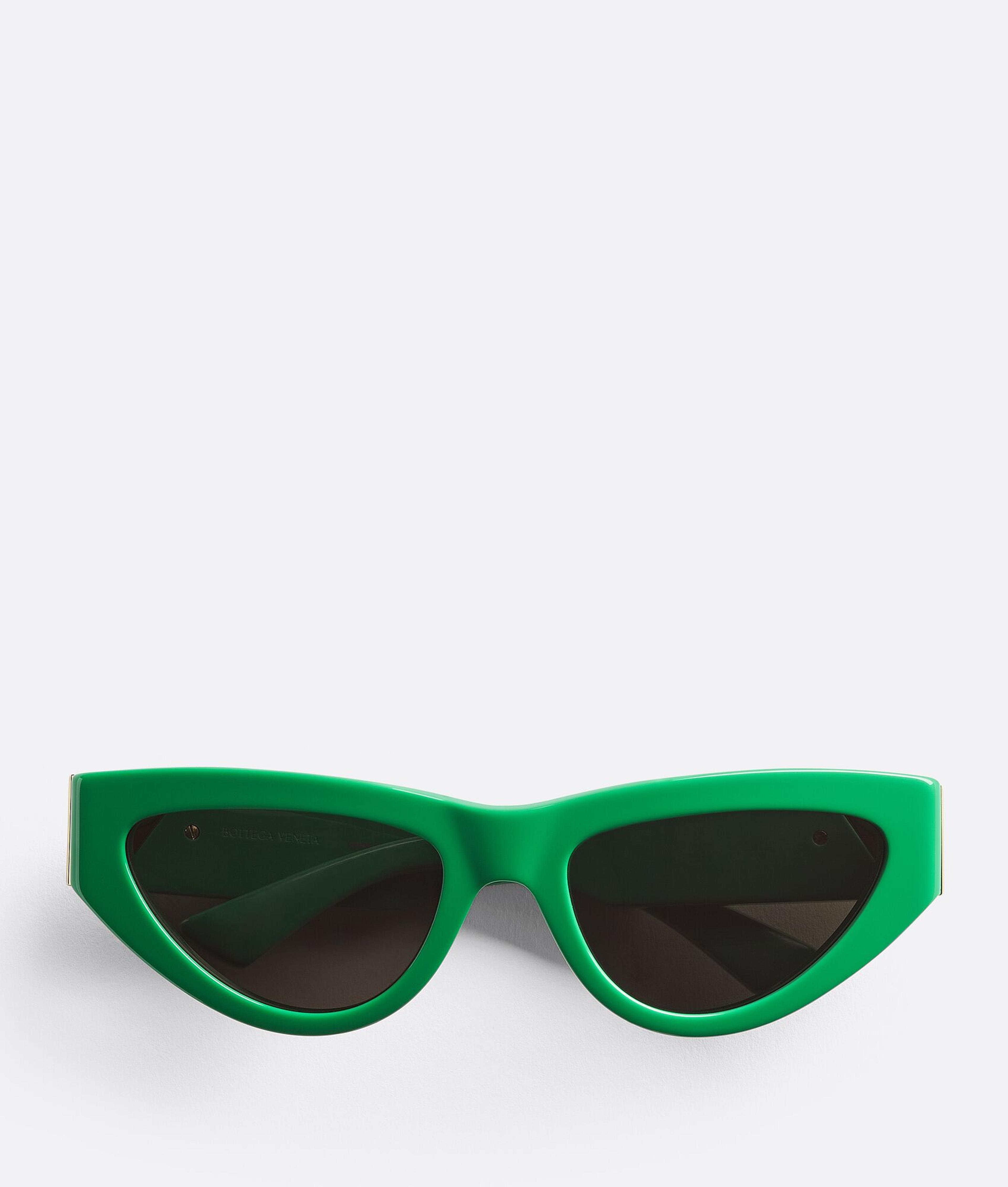 Bottega Veneta® Women's Angle Acetate Cat-Eye Sunglasses in Green / Grey. Shop online now.