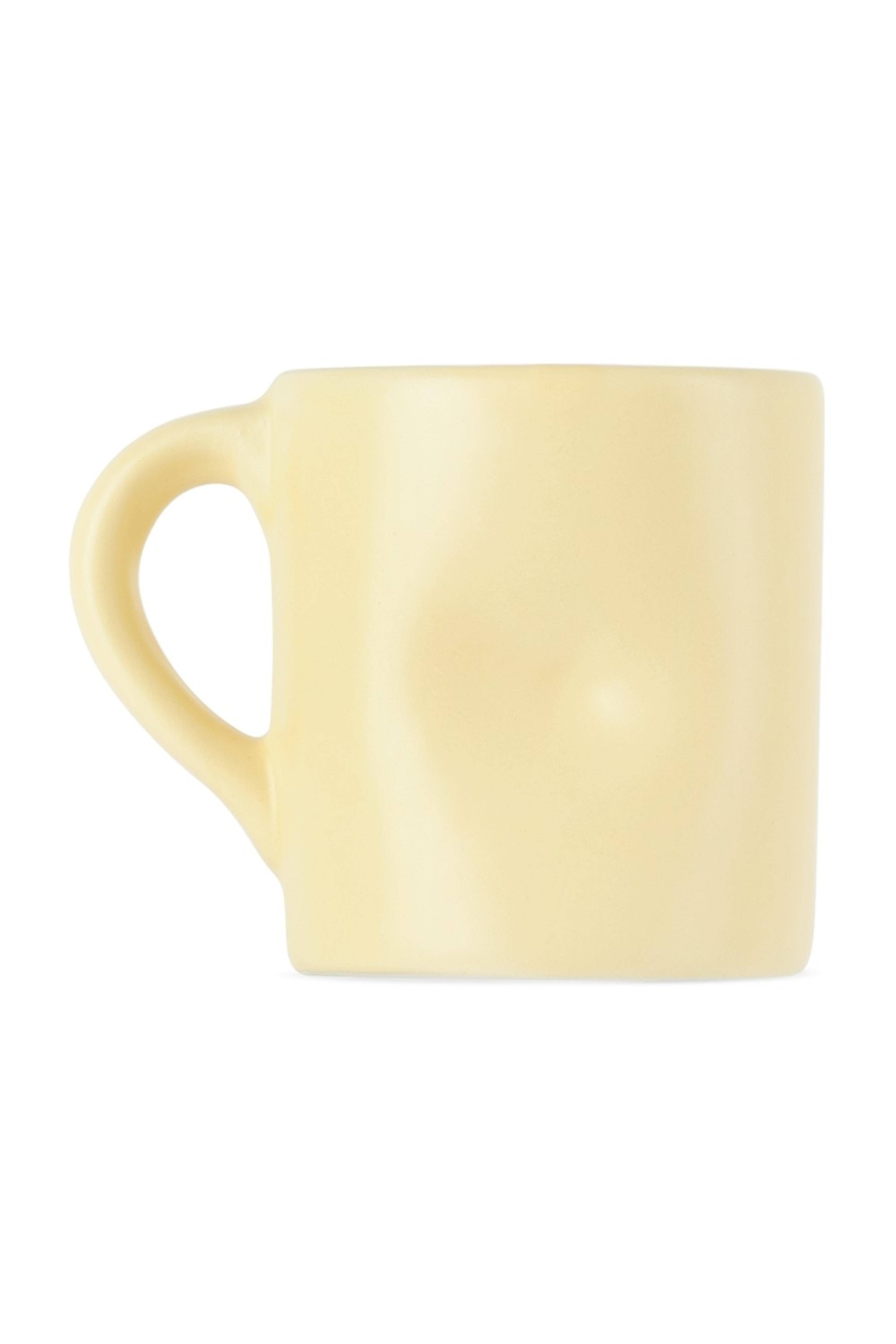 Yellow Bumpity Bump Bump Mug by Completedworks on Sale