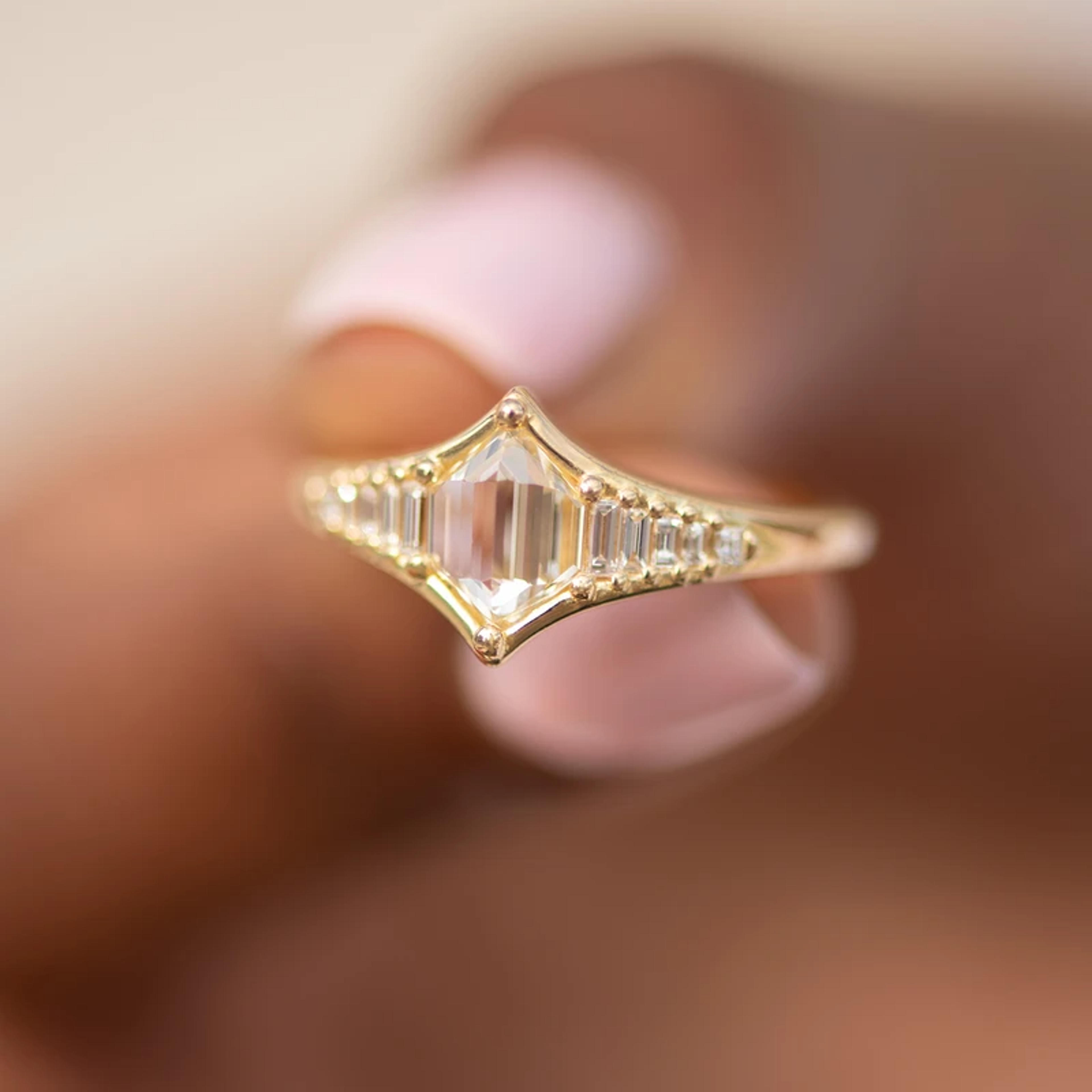 Art Deco Inspired Engagement Ring with One of a Kind step cut Diamond
