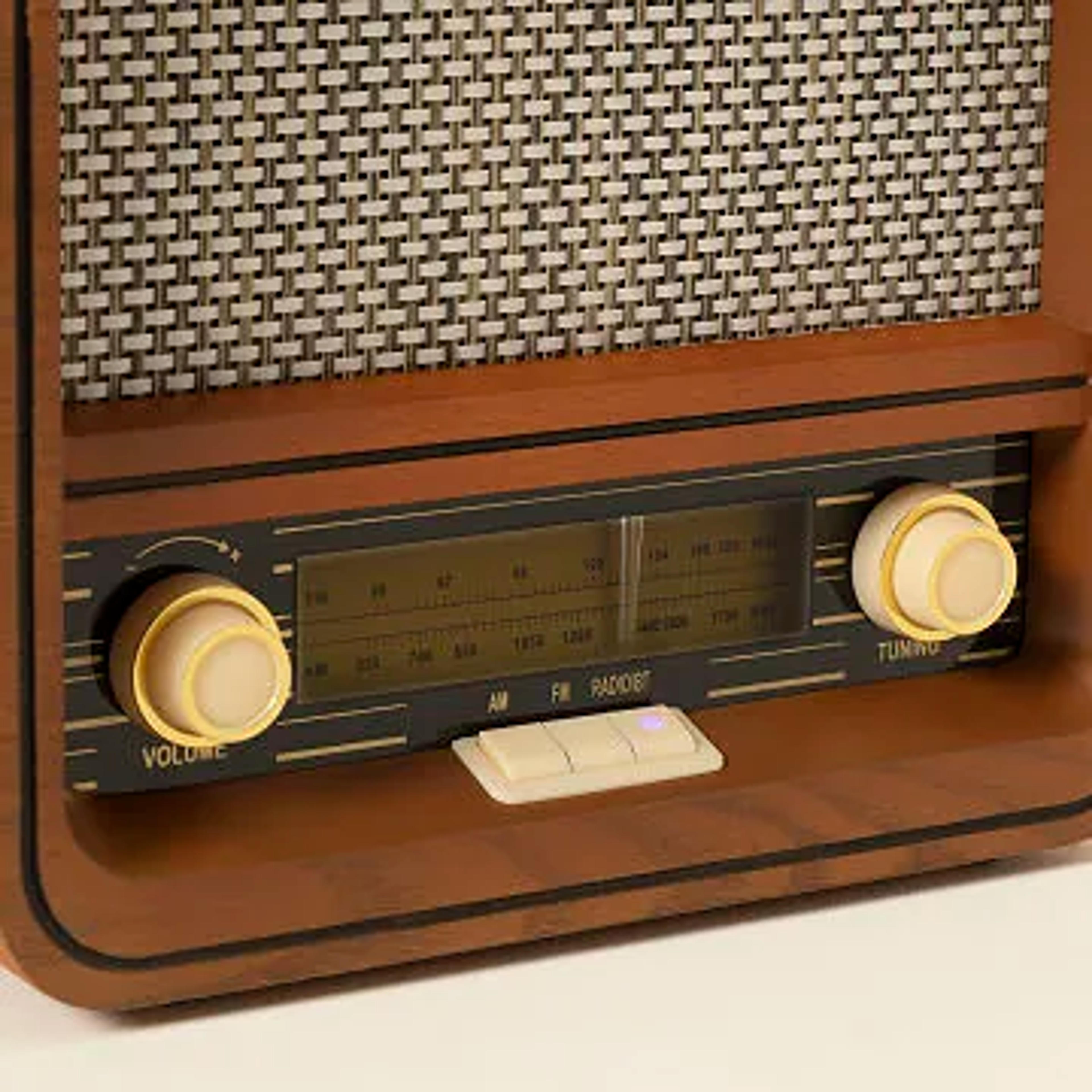 uncommongoods.com/product/throwback-speaker-with-bluetooth-radio