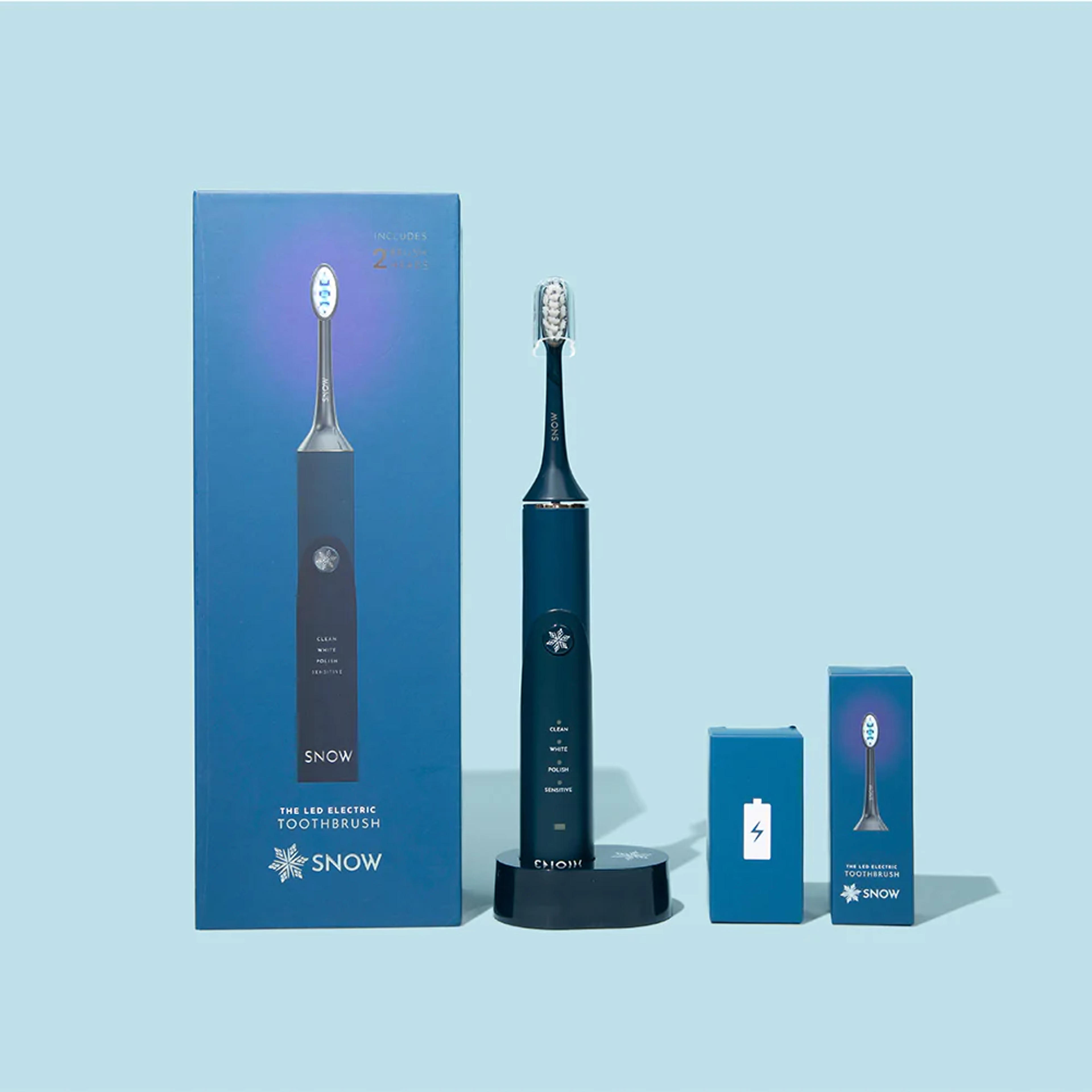 The LED Electric Teeth Whitening Toothbrush by SNOW®
