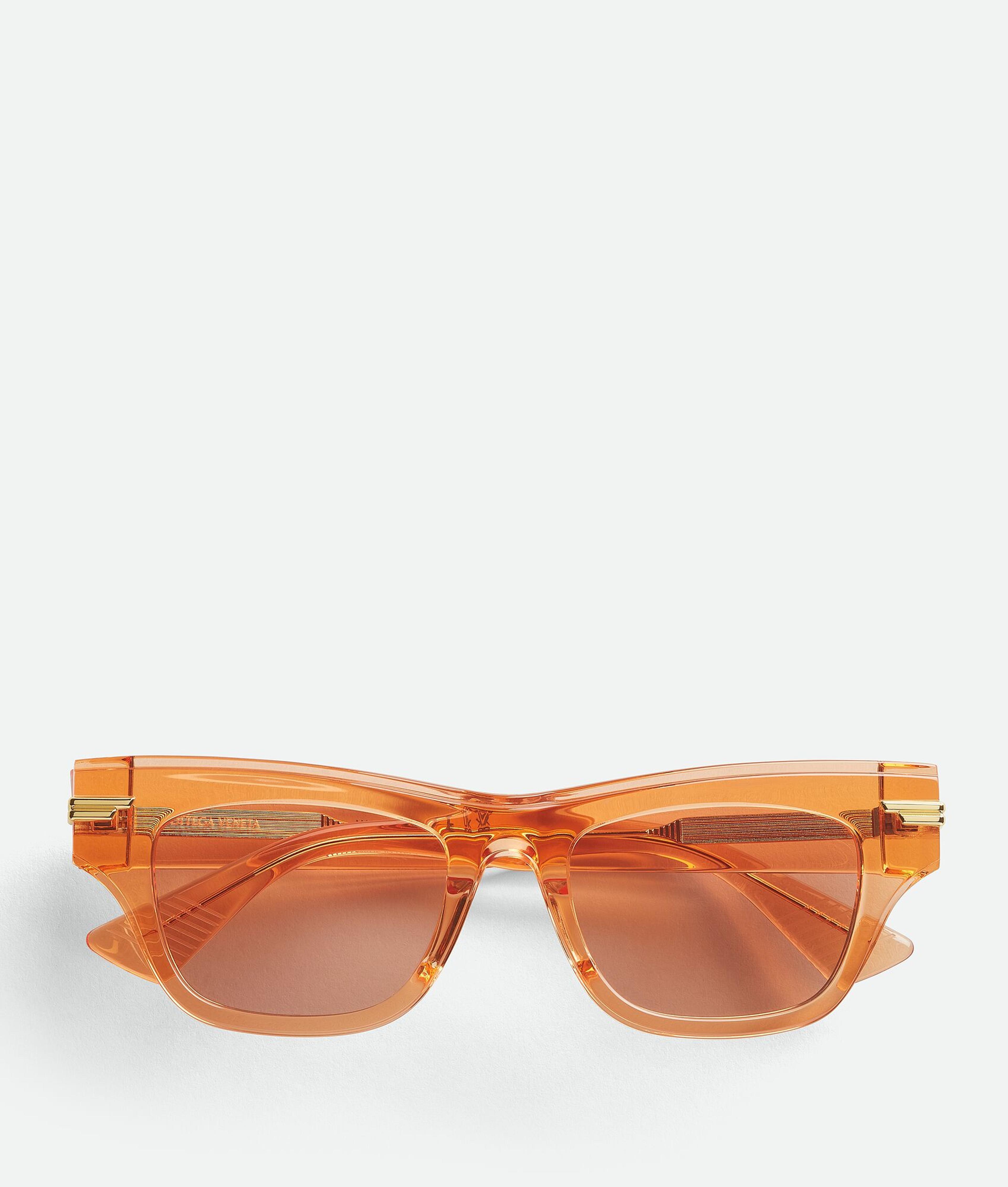 Bottega Veneta® Women's Mitre Square Sunglasses in Orange / Brown. Shop online now.