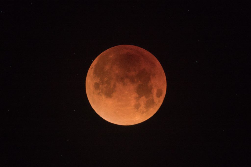 Blood moon in the night. Make your daily routine with a bedtime routine.