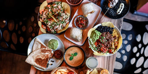 Chefs preparing Mexican cuisine in the kitchen