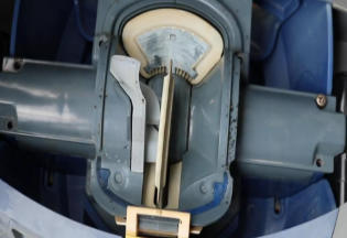 Screenshot 2026-04-28 93808 Am - Diy Pool Resources - Inyopools.com Close-up of a vehicle headlight housing with the bulb socket and mounting bracket exposed