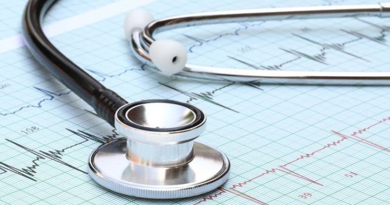 Strethoscope on heartbeat graph