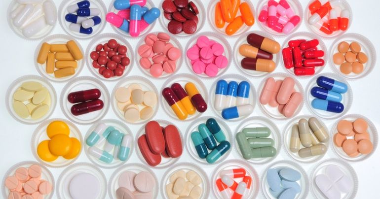 assortment of pills and capsules