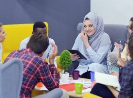 group of young people, Startup entrepreneurs working on their venture in coworking space