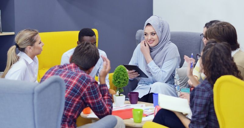 group of young people, Startup entrepreneurs working on their venture in coworking space