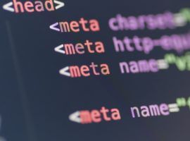 HTML meta tag code on computer screen