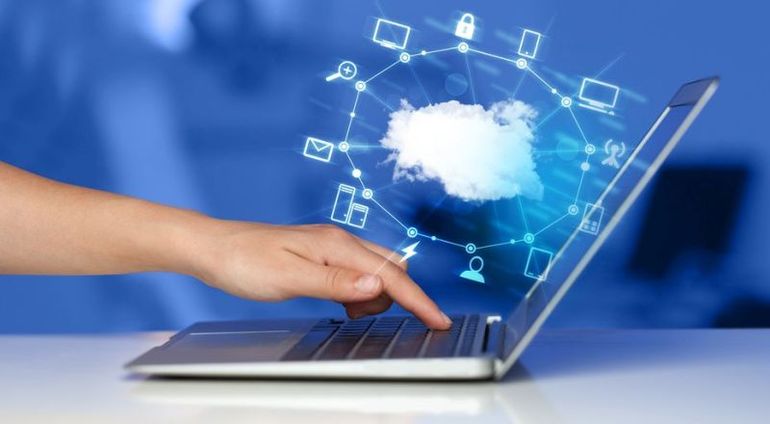 Hand working with a Cloud Computing diagram