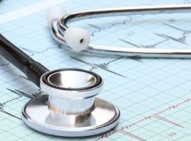 Strethoscope on heartbeat graph