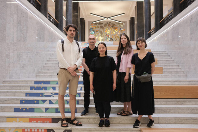 On the staircase of the Martynas Mažvydas National Library of Lithuania. From the left: Toms Herings, Dmitrijs Zinovjevs, Katrīna Teivāne, Sandra Ķempele, Līga Goldberga (National Library of Latvia). Photo: Živilė Časaitė