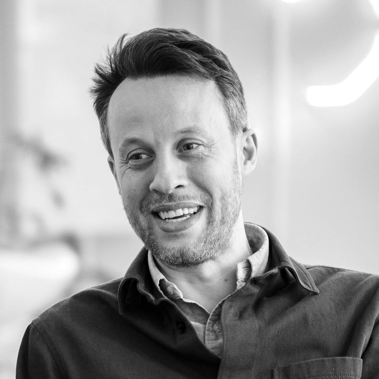 A grayscale profile picture of course director Michel Megherbi