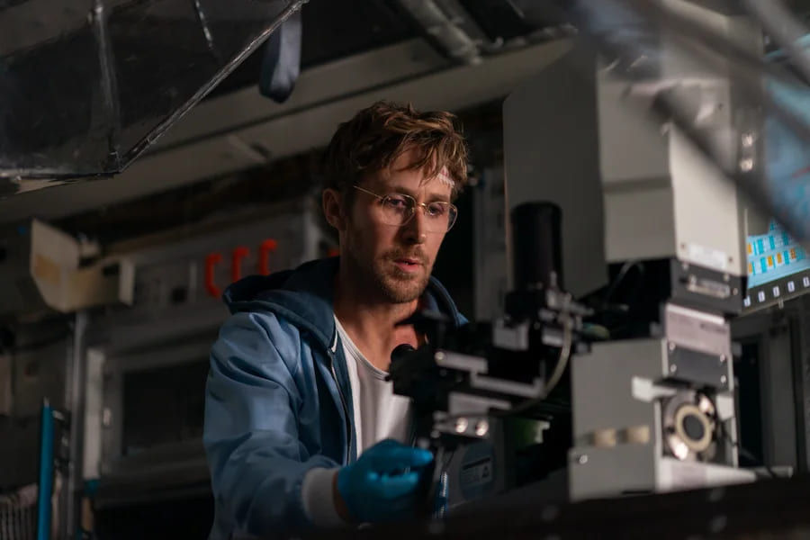 A medium shot of Ryan Gosling as Ryland Grace from the movie Project Hail Mary