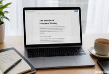Writer typing on a laptop doing freelance writing in Nigeria