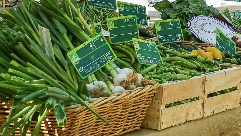 Photo d'un stand de légumes