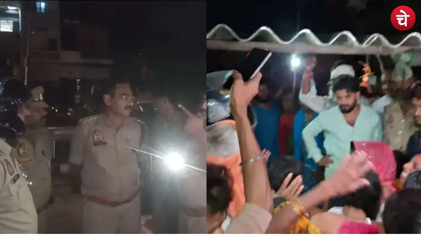 Protest held with body placed on the road following the suspicious death of a guard in Mughalsarai; police present at the scene