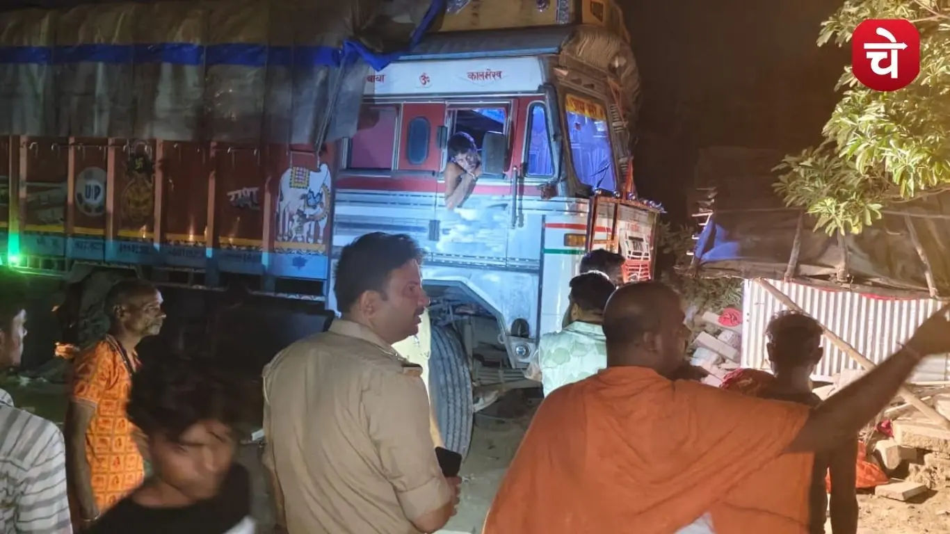 truck rams into house