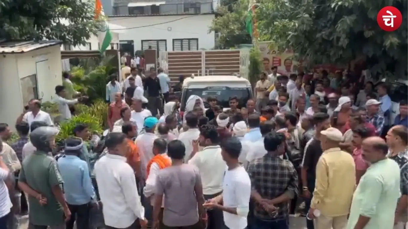 A large crowd gathered outside the office of Noida MLA Pankaj Singh