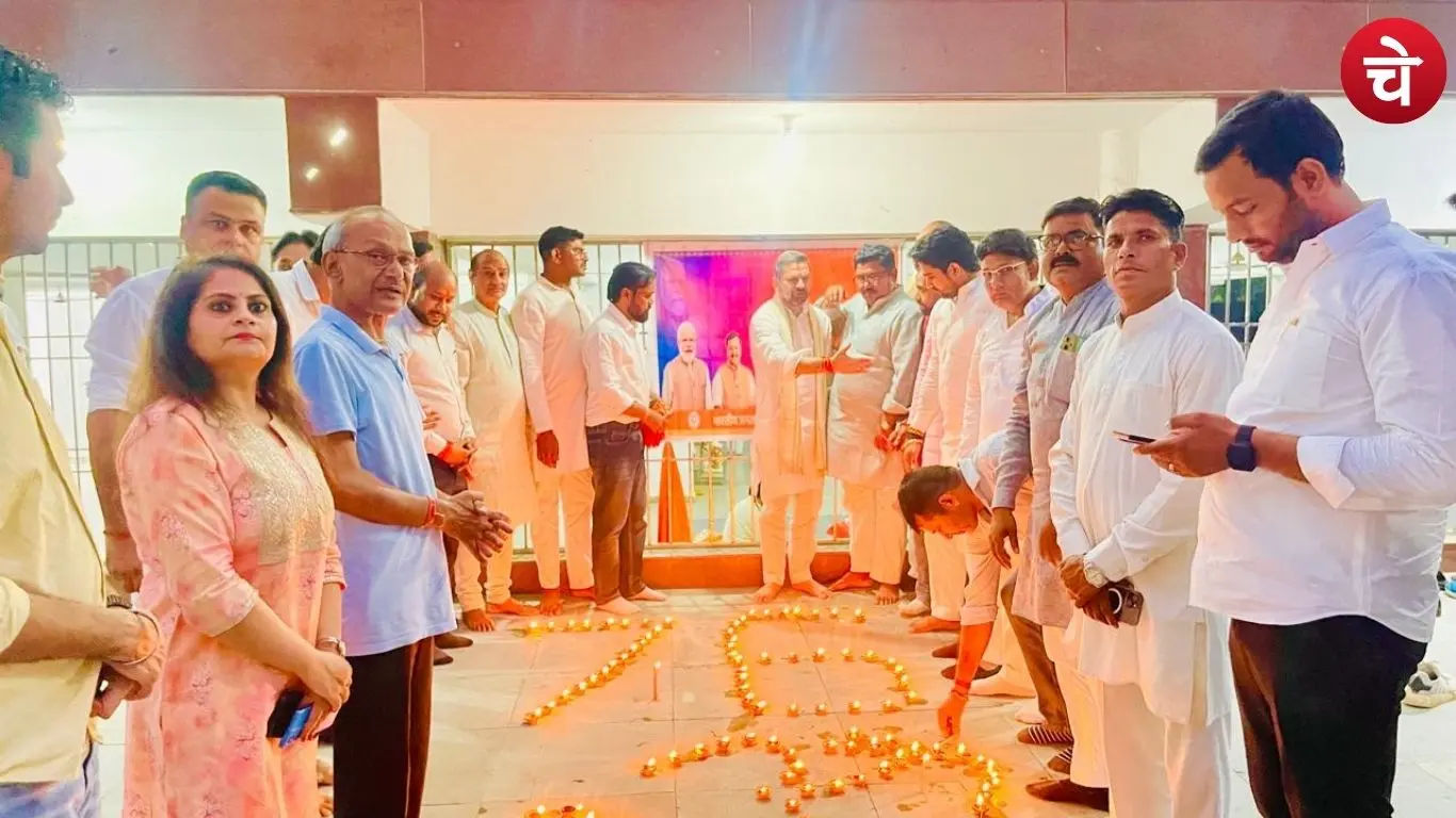 BJP workers lighting lamps at the Jhande Wala Temple in Greater Noida on PM Modi birthday