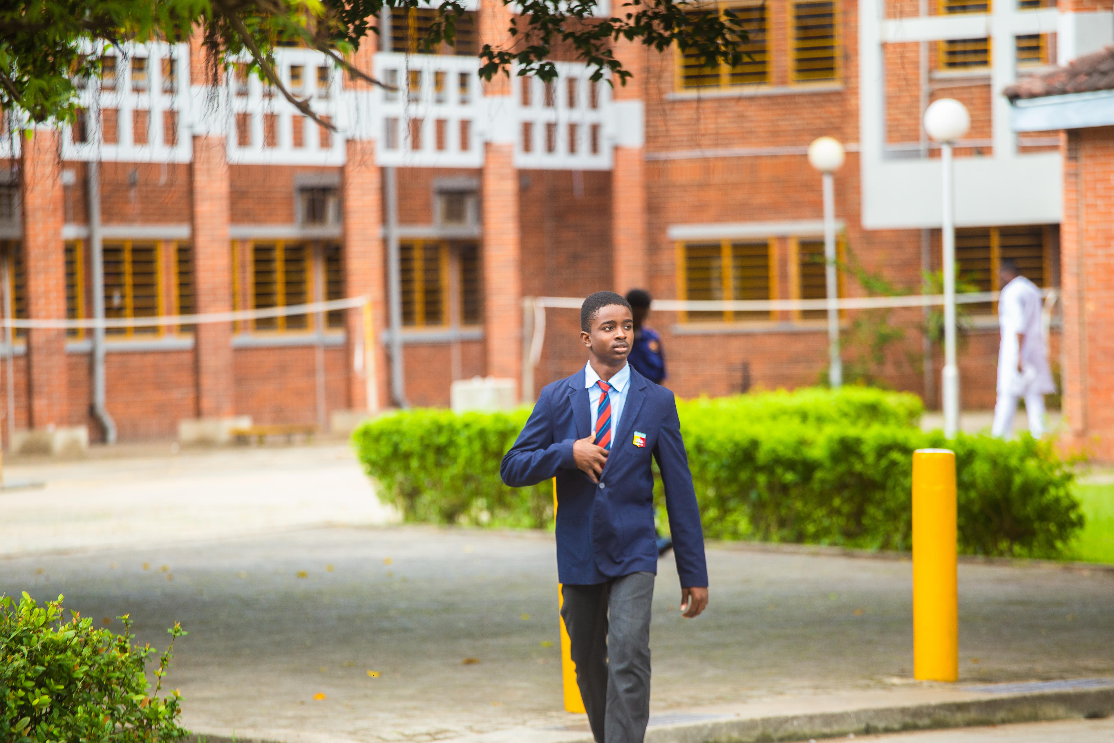 A Whitesands student walking outside the school