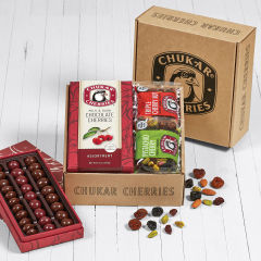 Open classic gift box shows packaging and contents for classic assortment, pistachio cherry, and triple cherry nut