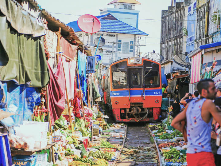 Train running through the Train Umbrella Market