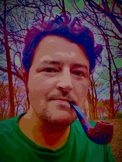 Cliff Jones Jr. smoking a pipe