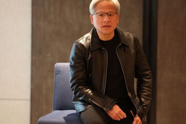 NVIDIAs CEO envisions a future where multi-shot agentic AIs armed with reasoning superpowers outperform humans in the job market