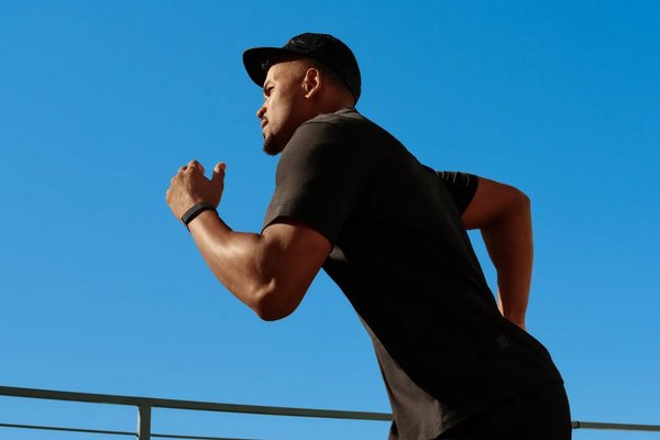 Fitbit Air vs. Whoop: Which screenless fitness tracker is better for you?