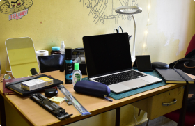 Cluttered hostel desk
