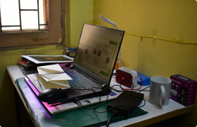 Cluttered hostel desk