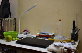 Cluttered hostel desk