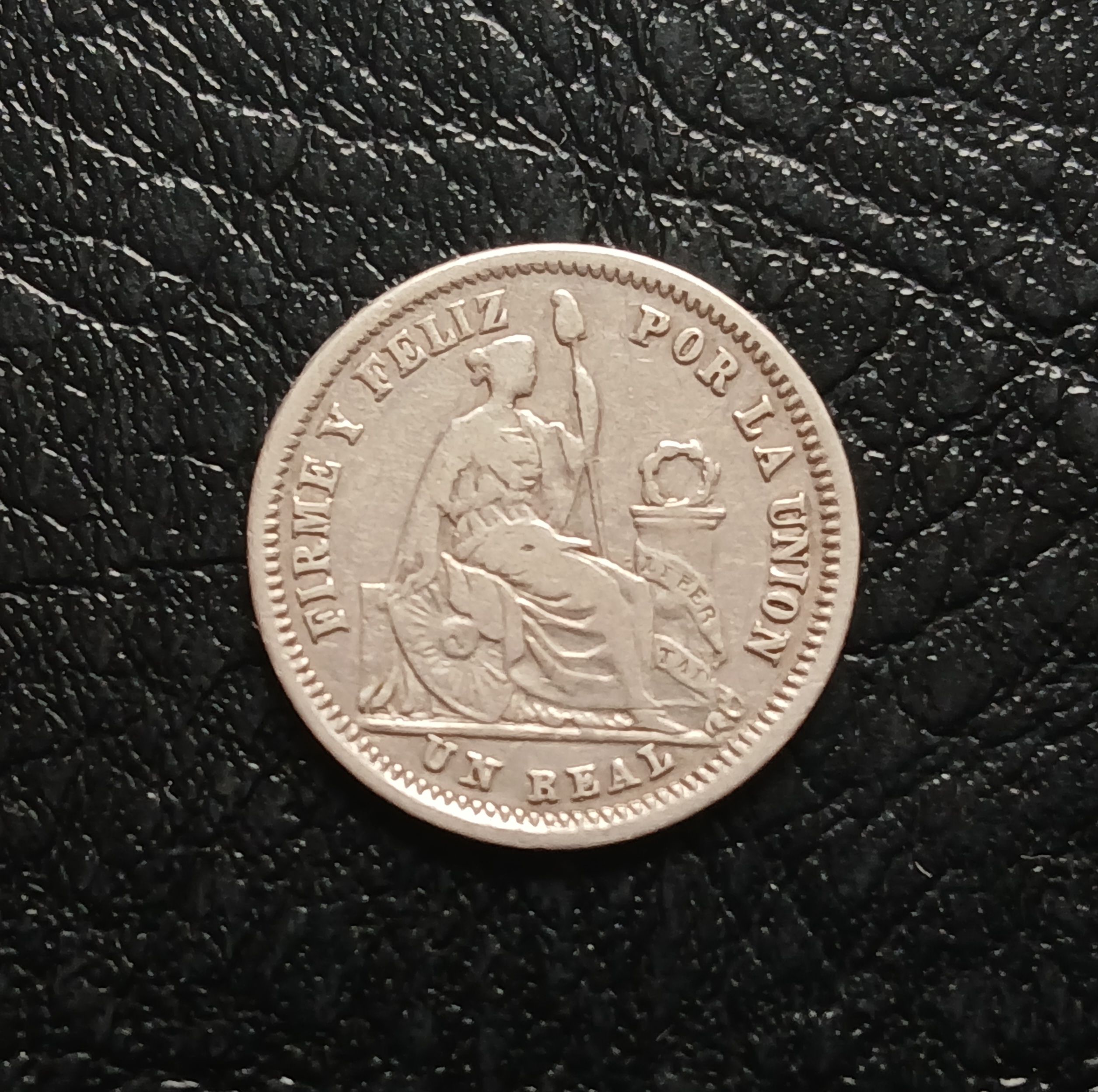 Un real Transicional año 1861 revirado plata 9 décimos