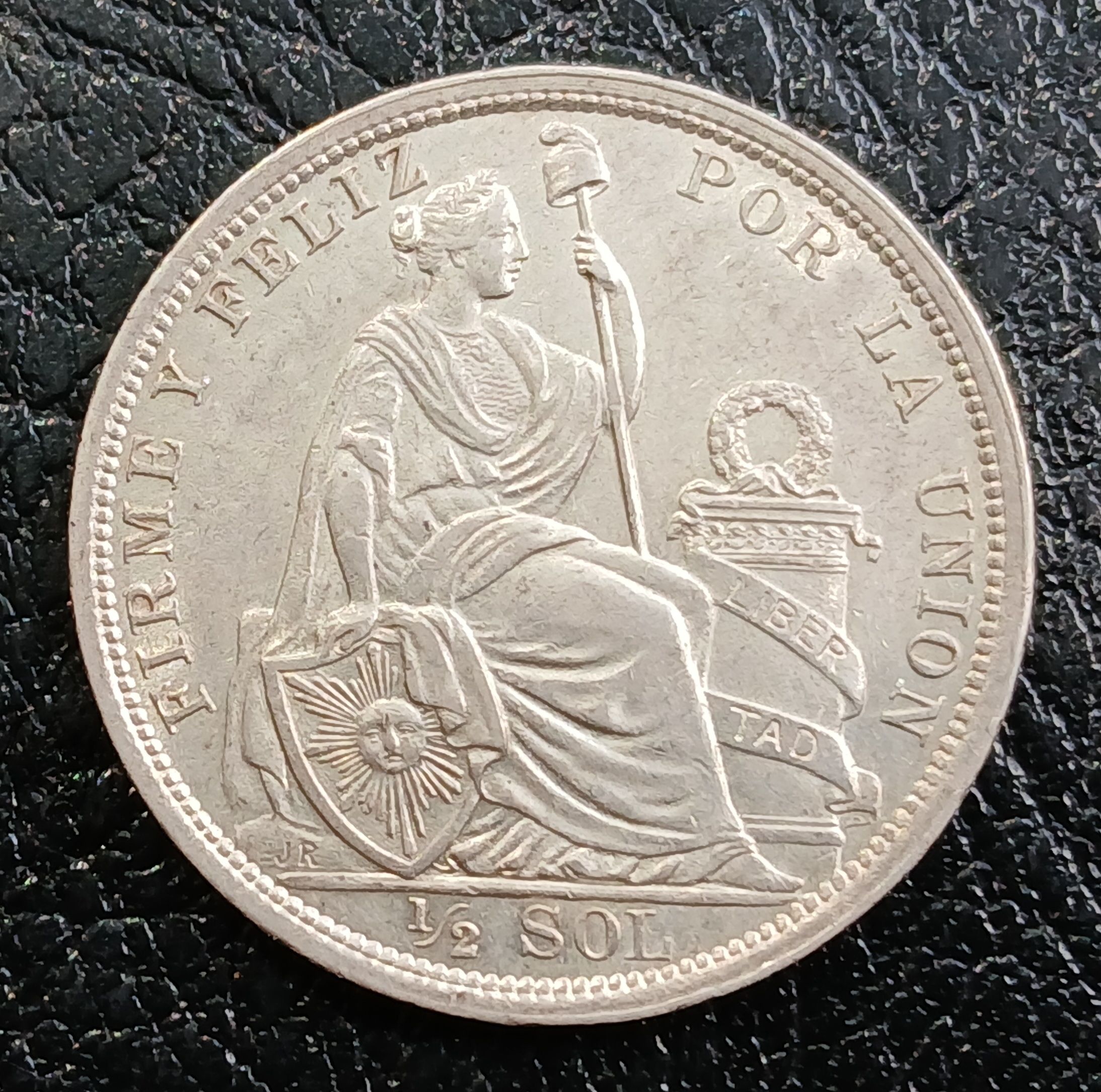 Medio sol año 1914 plata 9 décimos