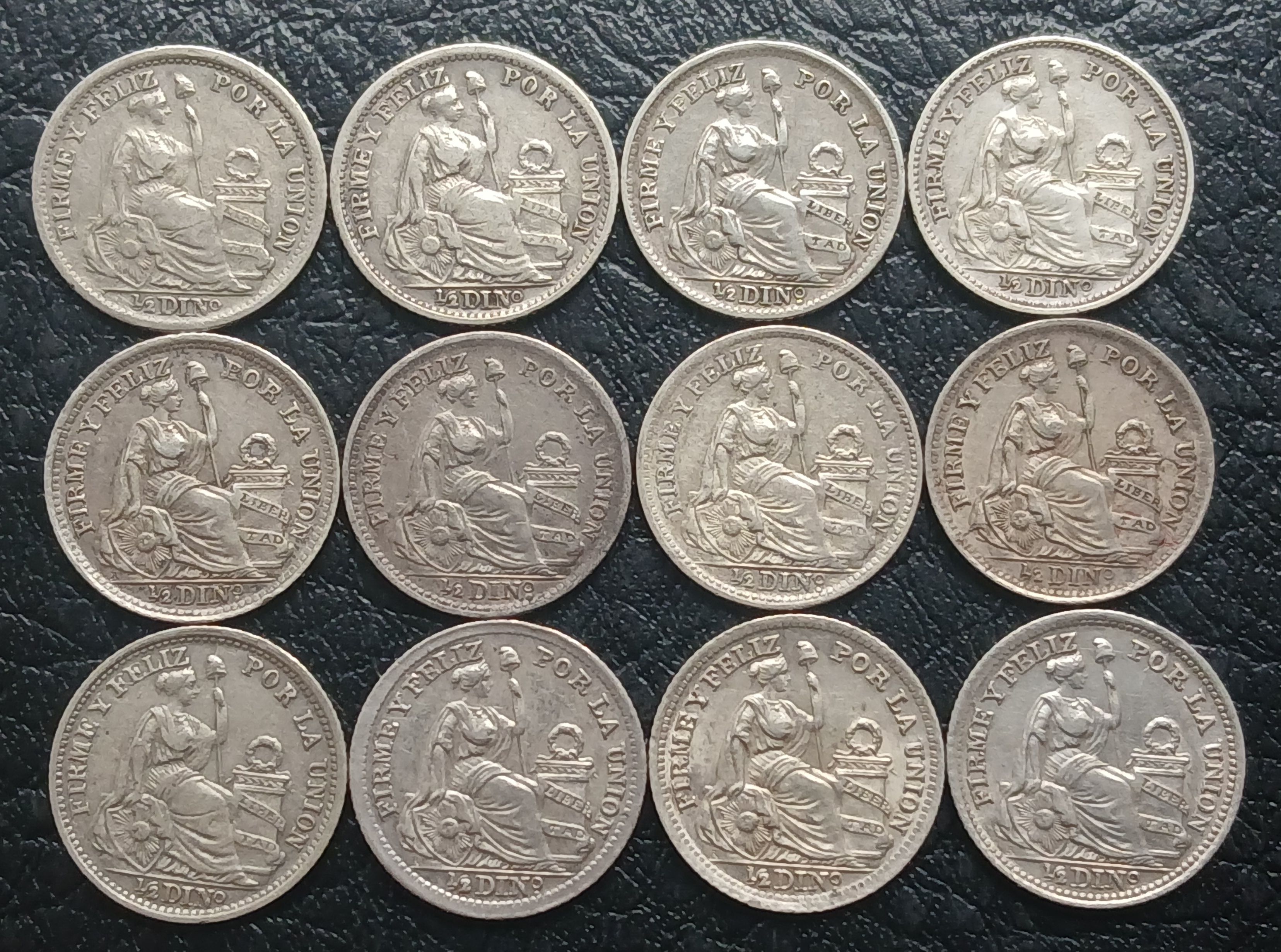 Monedas de medio dino plata 9 décimos