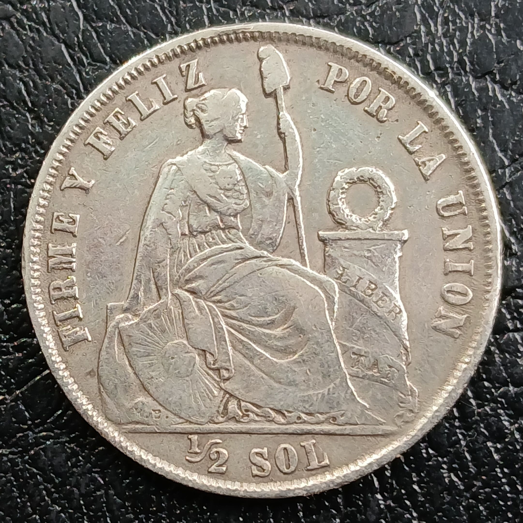 Medio sol año 1865 plata 9 décimos