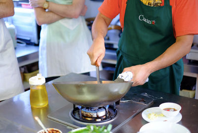 Cook with the Chef: Wok Skills and Stir Fry Class with Market Tour and Condiments class