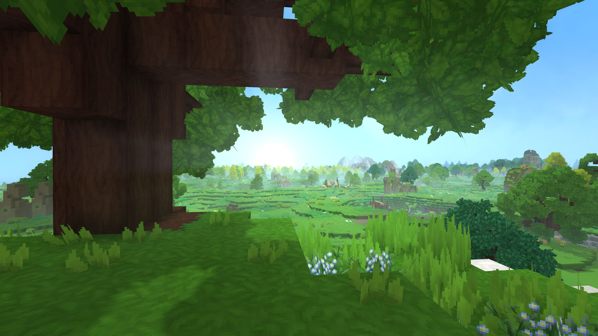 A wide green Hytale vista: tree canopy in the foreground, an open plain stretching to the horizon