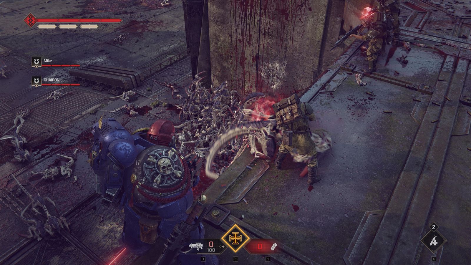 A Space Marine fighting Tyranids at close range with an empty ammo counter