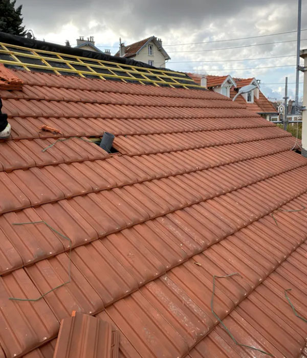 Création et rénovation de toiture tuiles, ardoises, bac acier à Meudon par Artisan Meuche - couvreur dans le 92