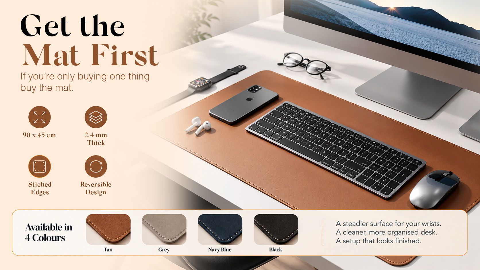 A 90x45cm V Cube Designs vegan leather desk mat acting as computer desk accessories holding a laptop, keyboard, and mouse.