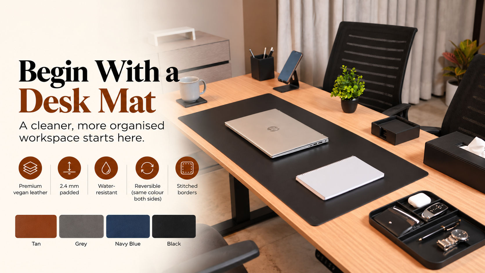 A 90x45cm V Cube Designs vegan leather desk mat acting as office table accessories holding a laptop, keyboard, and mouse.