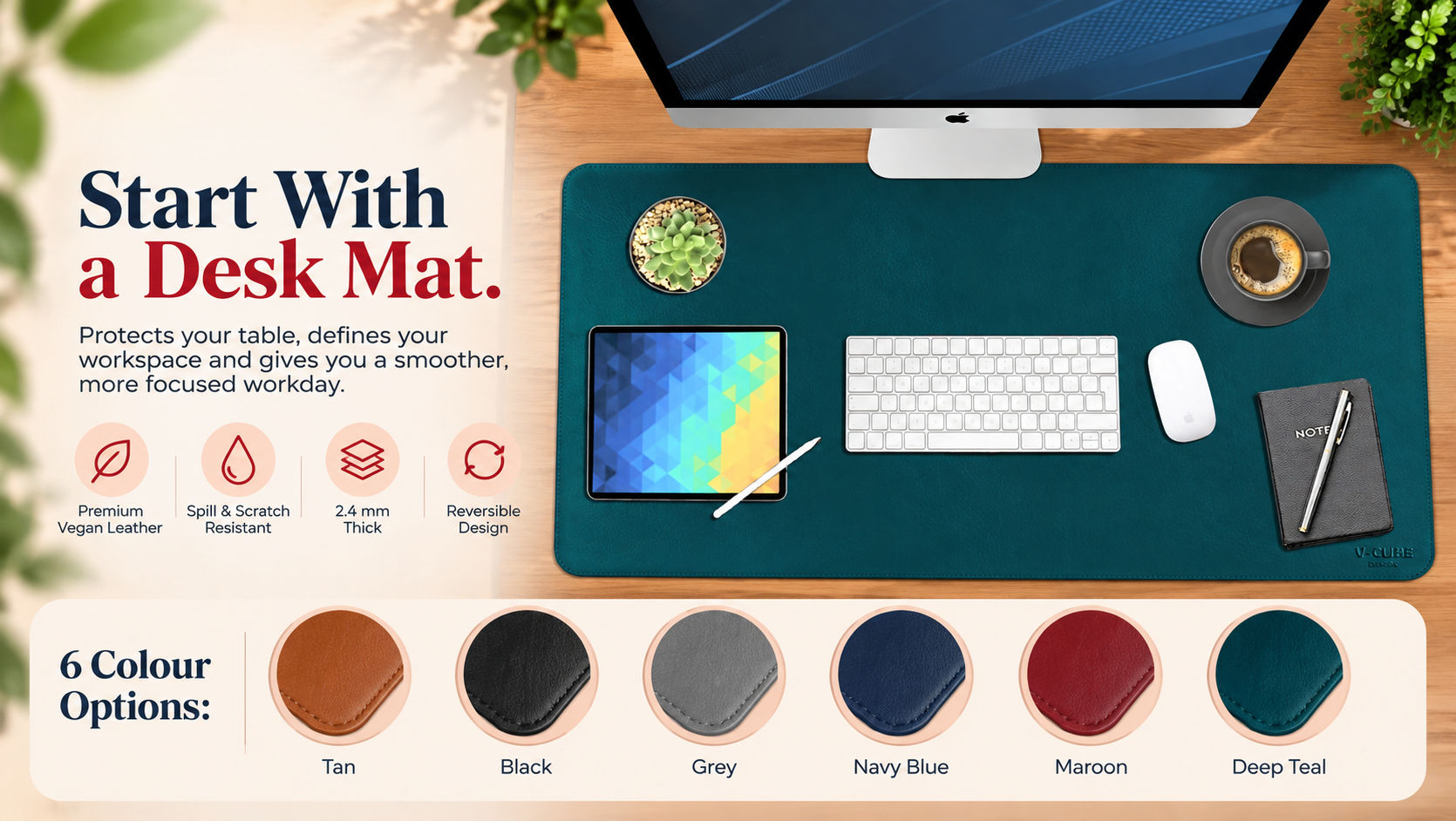 A 90x45cm leather desk mat acting as the main base for modern office desk accessories with laptop and keyboard.