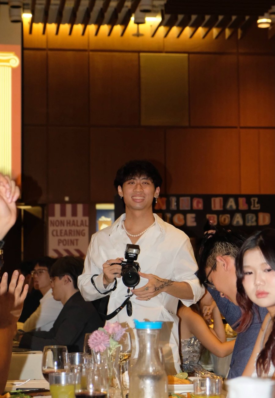Carlson with his camera at an event
