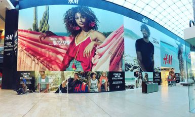 Installation of a large format wrap in a shopping center